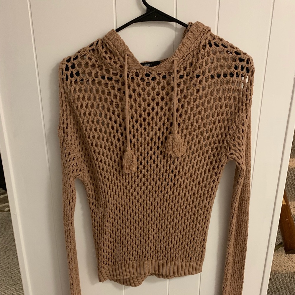 Knitted light brown sweater